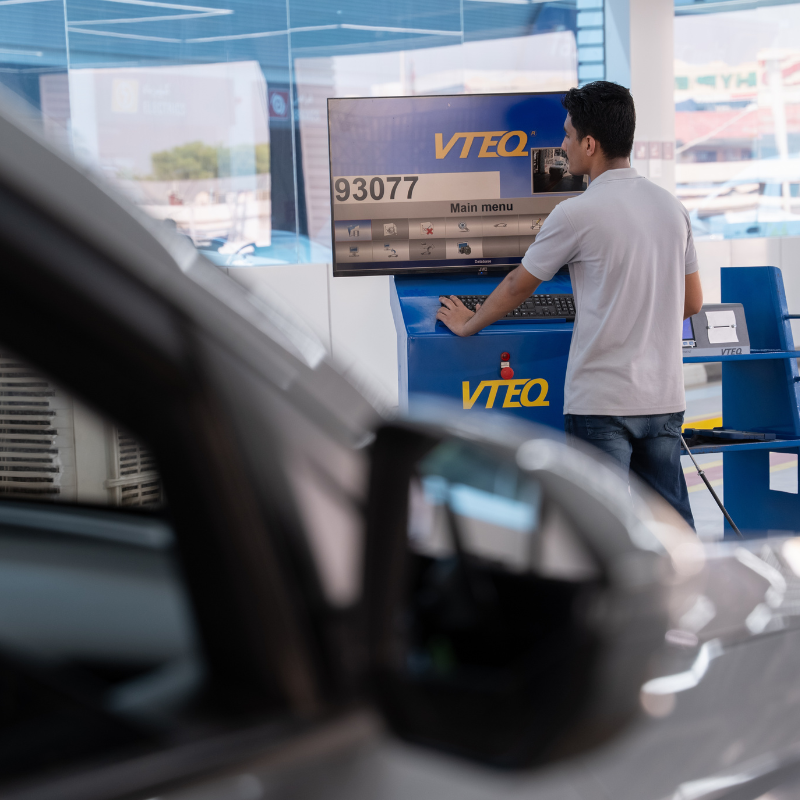 Expert technicians at Al Ghurair Mobility centres performing vehicle testing and registration across the Emirates